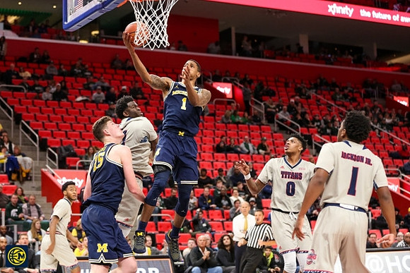 Jon Teske (15) and Charles Matthews (1)