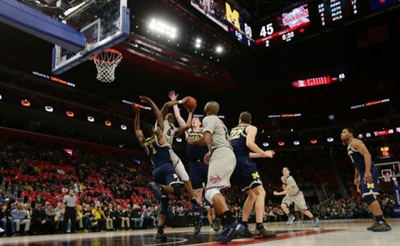 Charles Matthews (1), Jon Teske (15), Duncan Robinson (22), and Jaaron Simmons (5)
