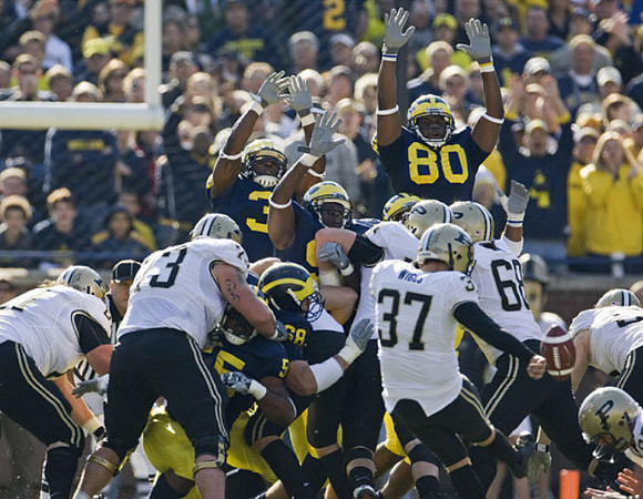Brandon Graham (55), Mike Martin (68), Stevie Brown (3), and Martell Webb (80)