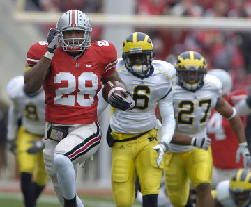 Donovan Warren (6), Brandon Harrison (27), and Jonas Mouton (8)