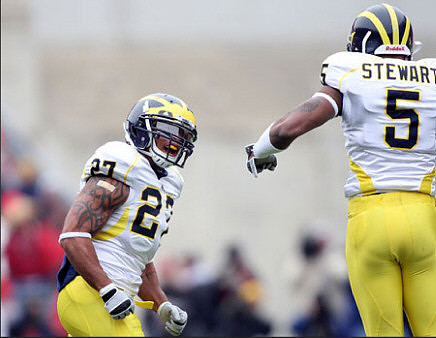 Brandon Harrison (27) and Charles Stewart (5)