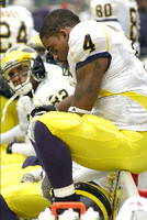 Brandon Minor (4) and LaTerryal Savoy (82)