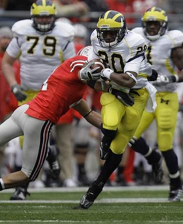 Michael Shaw (20), Brandon Minor (4), and Perry Dorrestein (79)