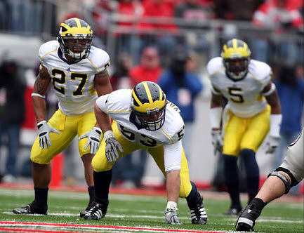 Brandon Harrison (27), Ryan Van Bergen (53), and Charles Stewart (5)