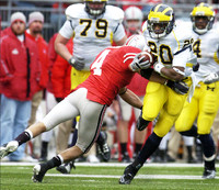 Michael Shaw (20), Brandon Minor (4), and Perry Dorrestein (79)