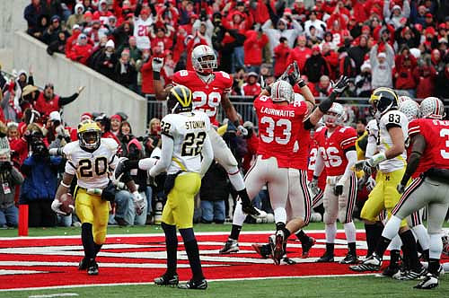 Michael Shaw (20), Darryl Stonum (22), and Mike Massey (83)