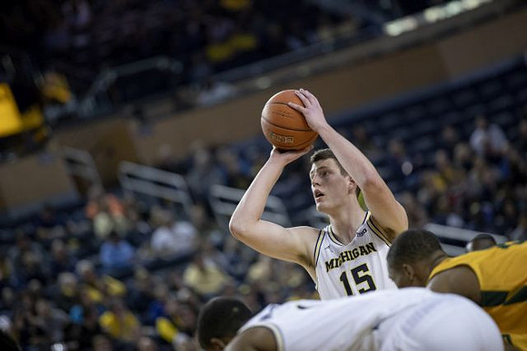 Jon Teske (15) and Charles Matthews (1)