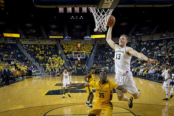 Eli Brooks (55), Ignas Brazdeikis (13), and Charles Matthews (1)