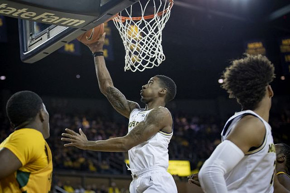 Charles Matthews (1) and Jordan Poole (2)