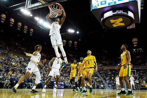 Jordan Poole (2), Zavier Simpson (3), and Charles Matthews (1)