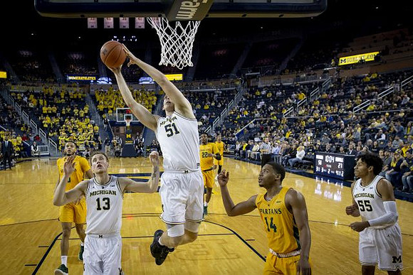 Ignas Brazdeikis (13), Austin Davis (51), and Eli Brooks (55)