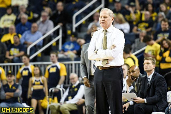 John Beilein, Saddi Washington, and Luke Yaklich