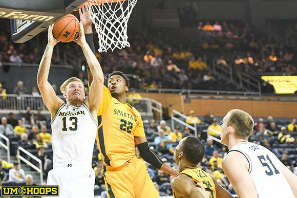 Ignas Brazdeikis (13) and Austin Davis (51)