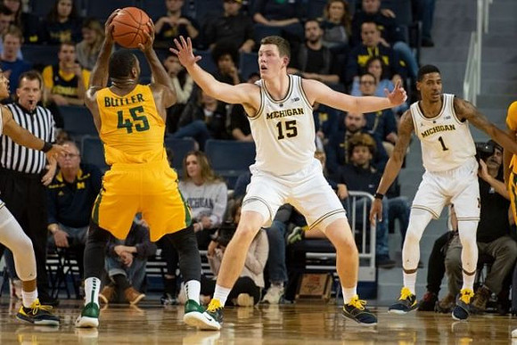 Jon Teske (15) and Charles Matthews (1)