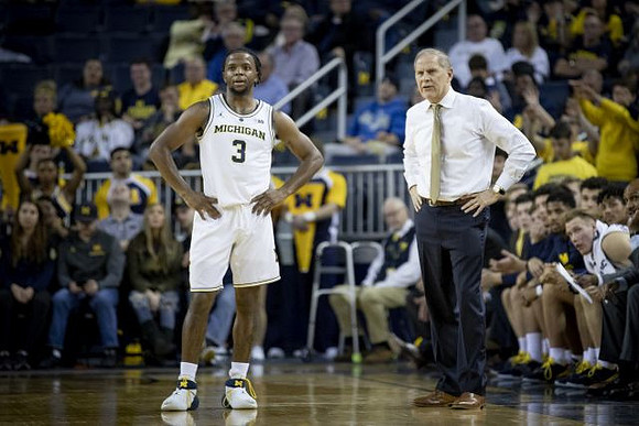 Zavier Simpson (3) and John Beilein