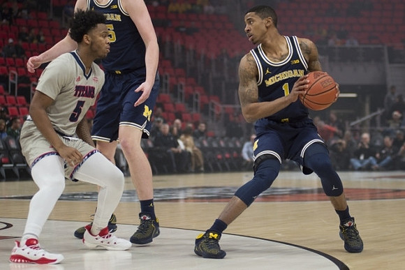Jon Teske (15) and Charles Matthews (1)