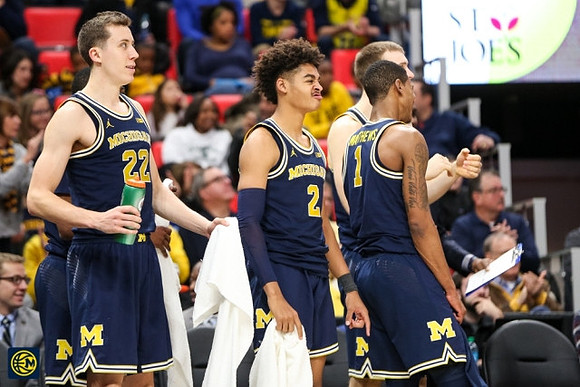 Duncan Robinson (22), Jordan Poole (2), and Charles Matthews (1)