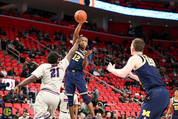 Muhammad-Ali Abdur-Rahkman (12) and Jon Teske (15)