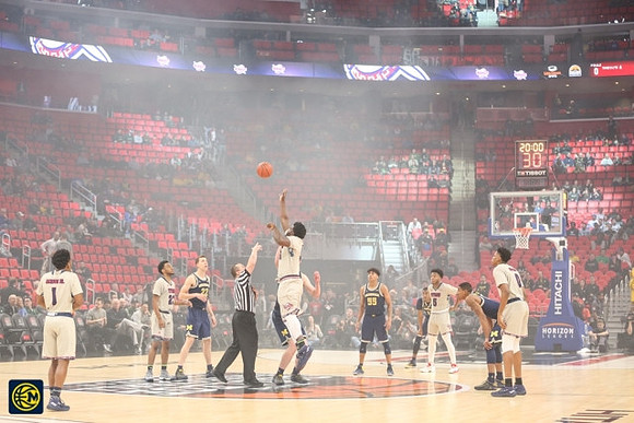 Duncan Robinson (22), Eli Brooks (55), and Charles Matthews (1)