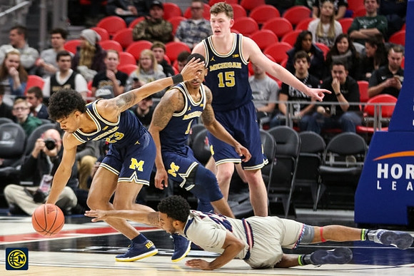 Ibi Watson (23), Charles Matthews (1), and Jon Teske (15)