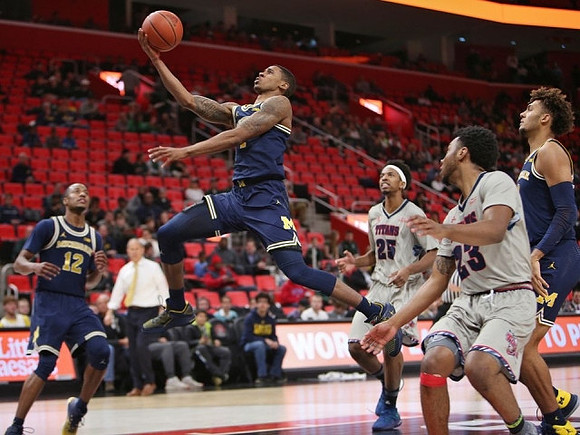 Muhammad-Ali Abdur-Rahkman (12), Charles Matthews (1), and Isaiah Livers (4)