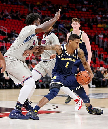 Charles Matthews (1) and Jon Teske (15)