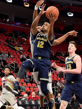 Muhammad-Ali Abdur-Rahkman (12) and Jon Teske (15)