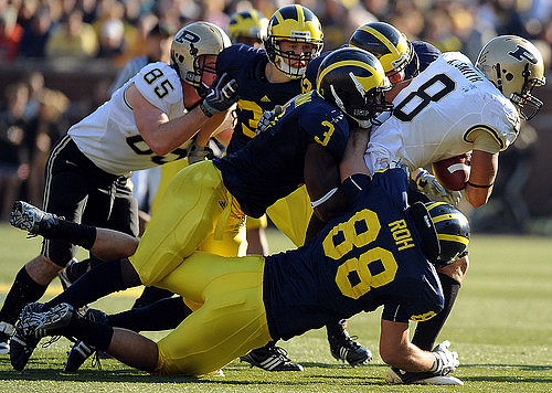 Jordan Kovacs (32), Stevie Brown (3), and Craig Roh (88)
