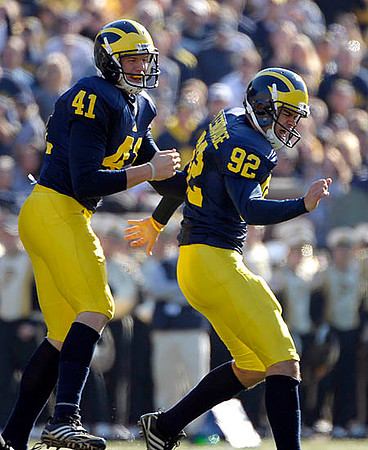Zoltan Mesko (41) and Jason Olesnavage (92)