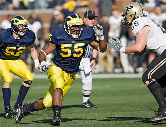 Kevin Leach (52) and Brandon Graham (55)