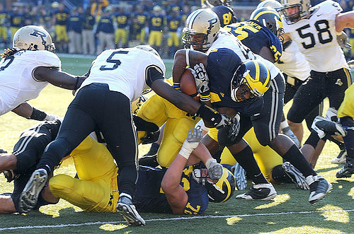 Brandon Minor (4), Patrick Omameh (65), and Mark Huyge (72)