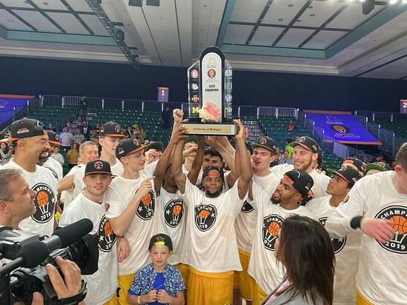 Juwan Howard, Michigan Team, and Battle for Atlantis Championship Trophy