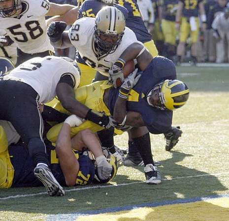 Brandon Minor (4), Mark Huyge (72), Patrick Omameh (65), and Mark Ortmann (71)