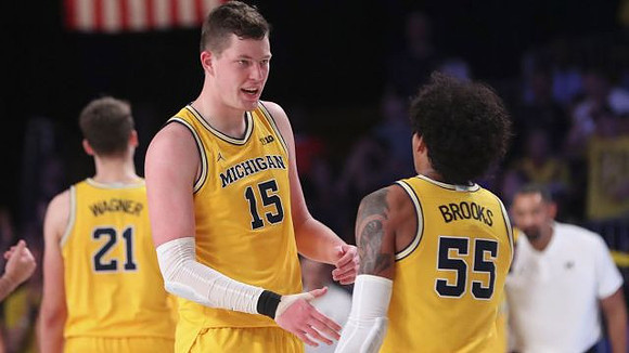 Franz Wagner (21), Jon Teske (15), and Eli Brooks (55)