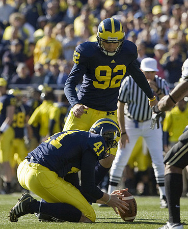 Jason Olesnavage (92) and Zoltan Mesko (41)
