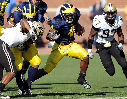 Kevin Grady (24), Brandon Minor (4) and Mark Ortmann (71)
