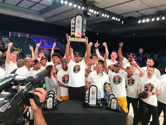 Juwan Howard, Michigan Team, and Battle for Atlantis Championship Trophy