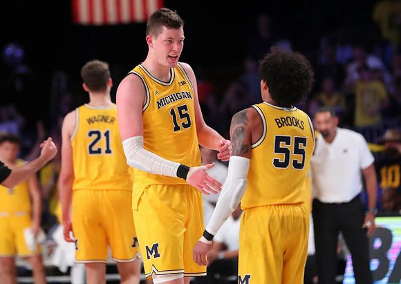 Franz Wagner (21), Jon Teske (15), and Eli Brooks (55)