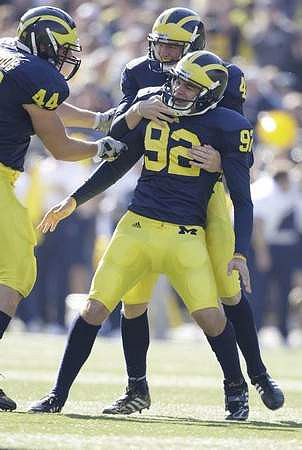 Mark Moundros (44), Jason Olesnavage (92), and Zoltan Mesko (41)