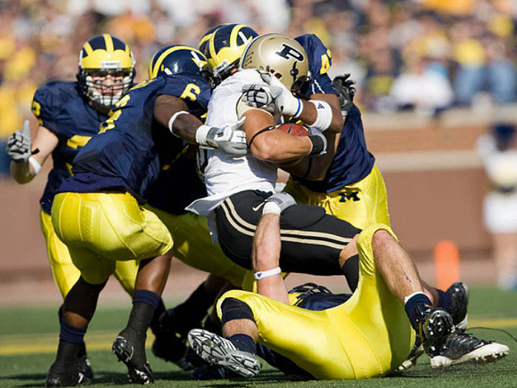 Jordan Kovacs (32), Donovan Warren (6), and J.B. Fitzgerald (42)