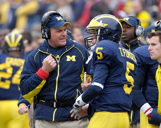 Rich Rodriguez and Tate Forcier (5)