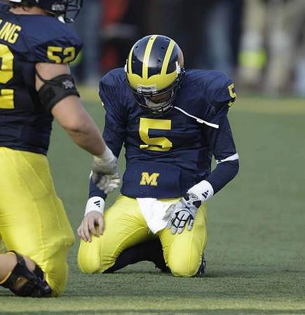 Stephen Schilling (52) and Tate Forcier (5)