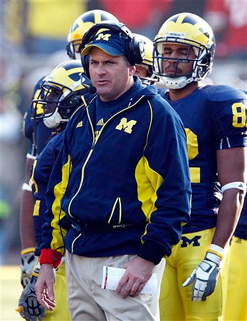 Rich Rodriguez and LaTerryal Savoy (82)