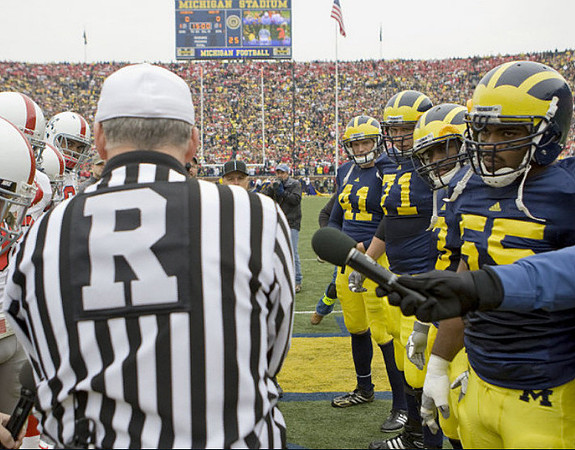 Zoltan Mesko (41), Mark Ortmann (71), Stevie Brown (3), and Brandon Graham (55)