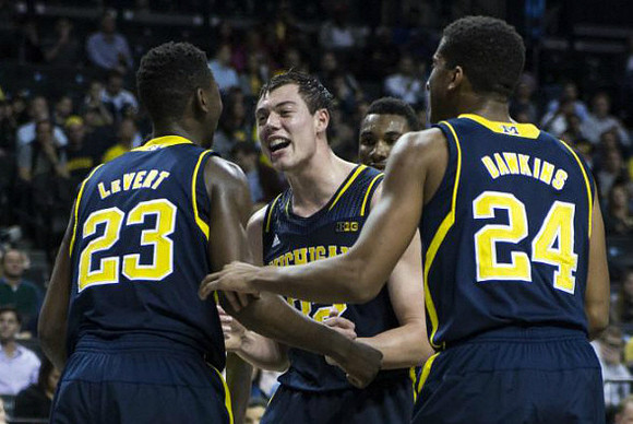 Caris LeVert (23), Ricky Doyle (32), and Aubrey Dawkins (24)