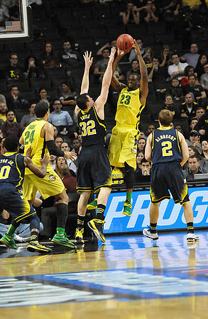 Derrick Walton Jr. (10), Ricky Doyle (32), and Spike Albrecht (2)
