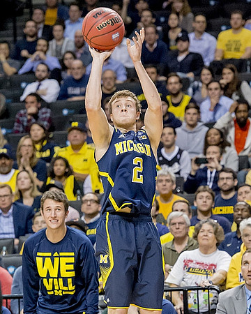 Spike Albrecht (2) and Andrew Dakich (11)