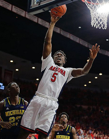 Caris LeVert (23) and Derrick Walton Jr. (10)