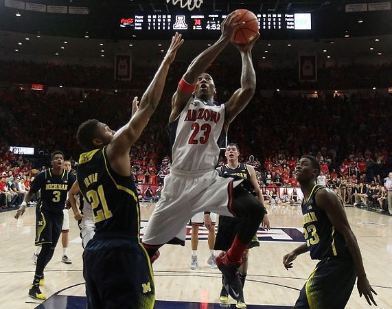 Kameron Chatman (3), Zak Irvin (21), Ricky Doyle (32), and Caris LeVert (23)