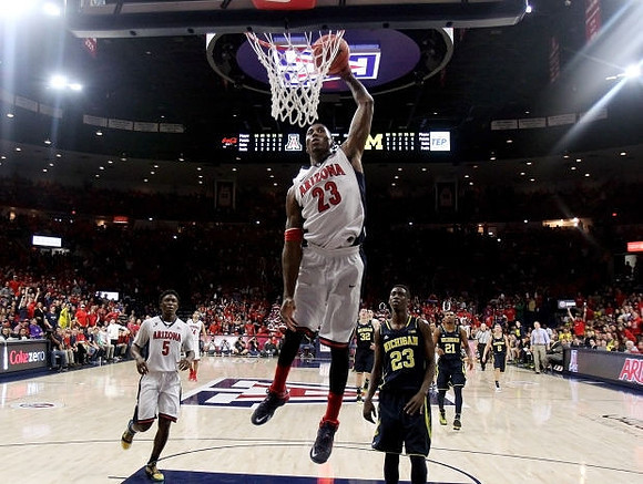 Caris LeVert (23), Ricky Doyle (32), Zak Irvin (21), and Spike Albrecht (2)